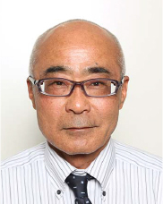 積 賢次郎